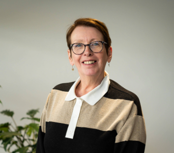 Headshot of Michele Grimshaw, Area Mentor for North West England, taken 2024