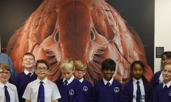 children attending an exhibition of outstanding images from the world of microscopy