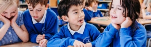 primary children engaged in classroom talk